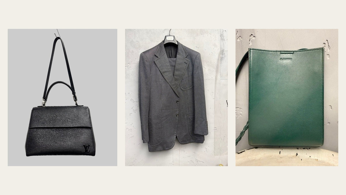 Pre-owned luxury at Berlin Vintage Corner: a black Louis Vuitton Epi leather bag, a grey Yves Saint Laurent Rive Gauche suit and a green Jil Sander leather shoulder bag