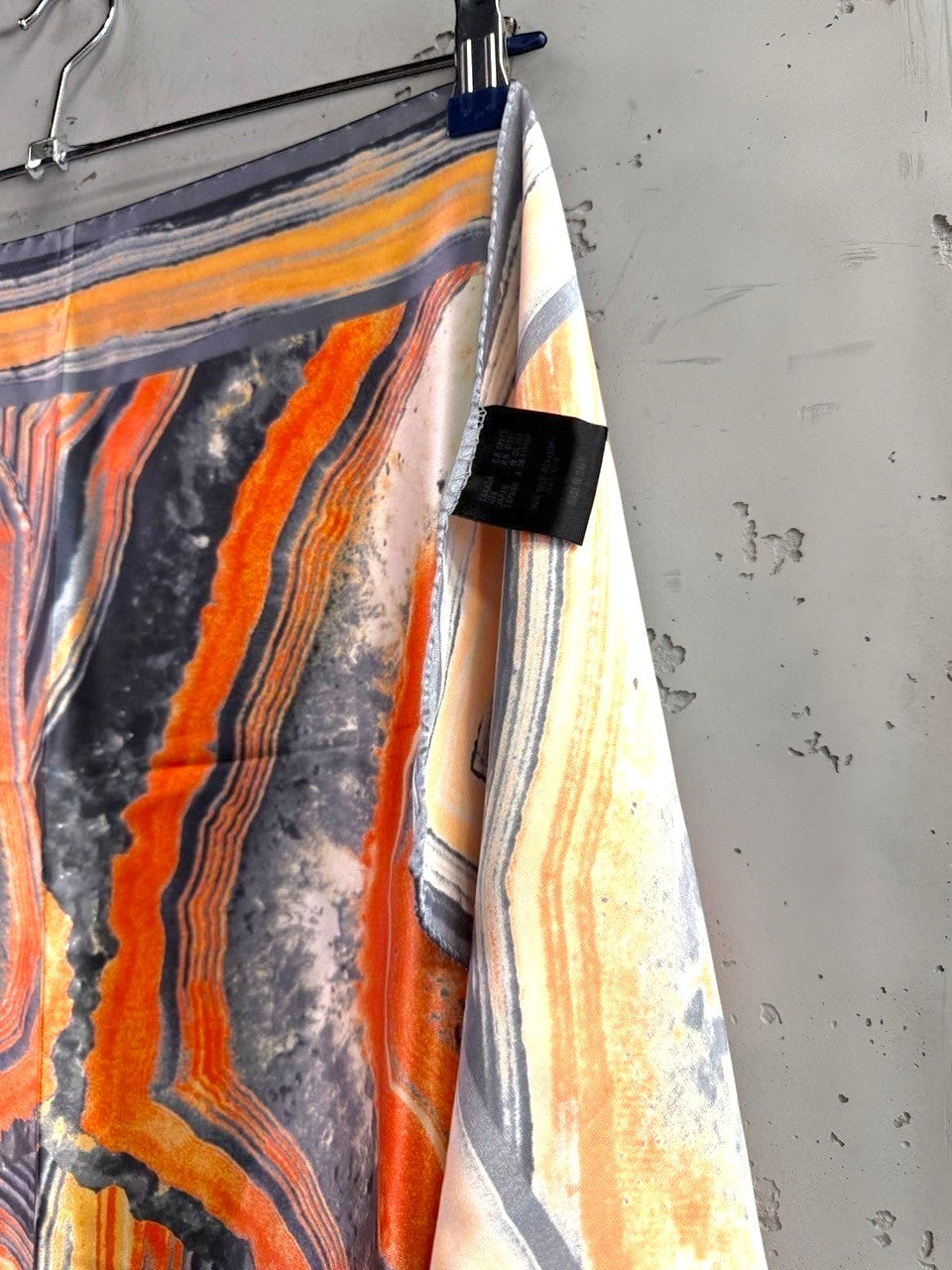 BERLIN VINTAGE CORNER silk fashion scarf featuring a geode-inspired abstract print in burnt orange, charcoal, and cream.