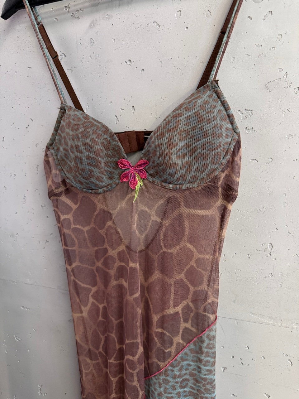 BERLIN VINTAGE CORNER sleeveless midi dress in brown and blue animal print mesh with a pink floral applique detail.