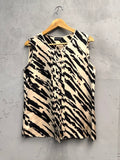 BERLIN VINTAGE CORNER sleeveless black and beige animal print silk blend blouse with pintuck detailing.
