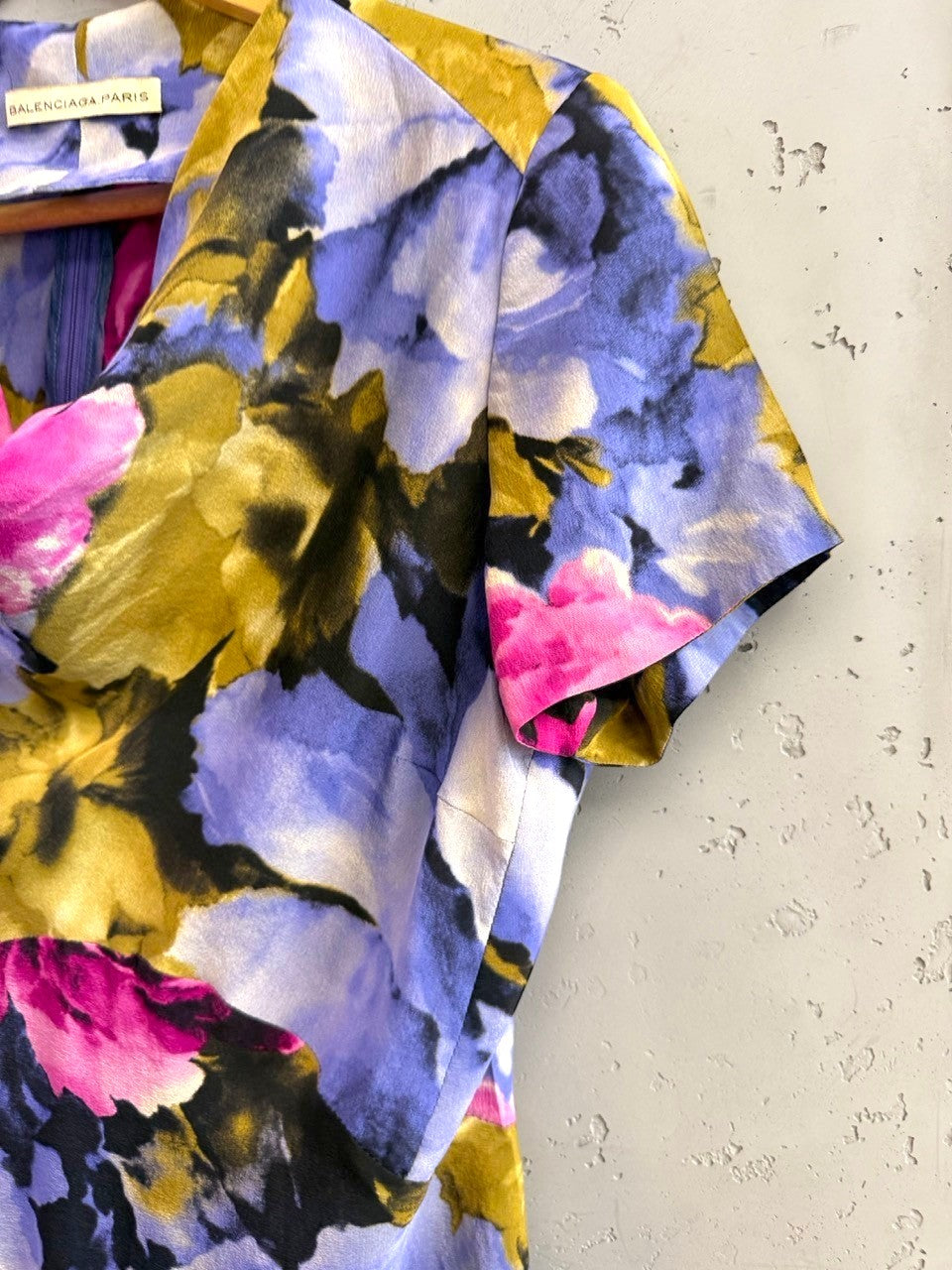 BERLIN VINTAGE CORNER Balenciaga short sleeve blouse featuring a vibrant fuchsia, violet, and olive floral print.