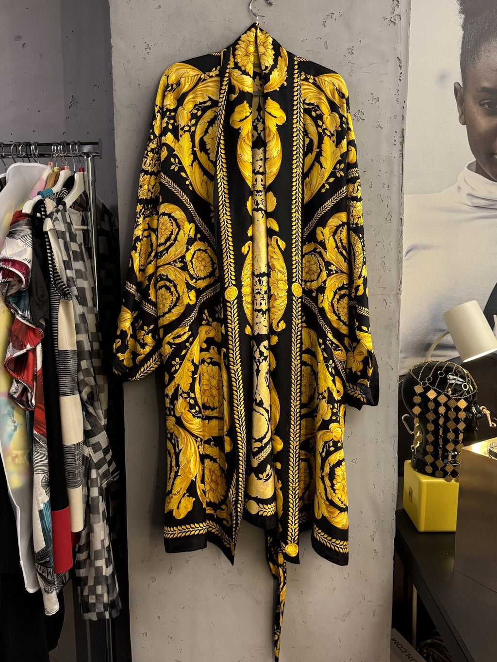 BERLIN VINTAGE CORNER long kimono robe featuring a bold black and gold baroque print with ornate patterns.