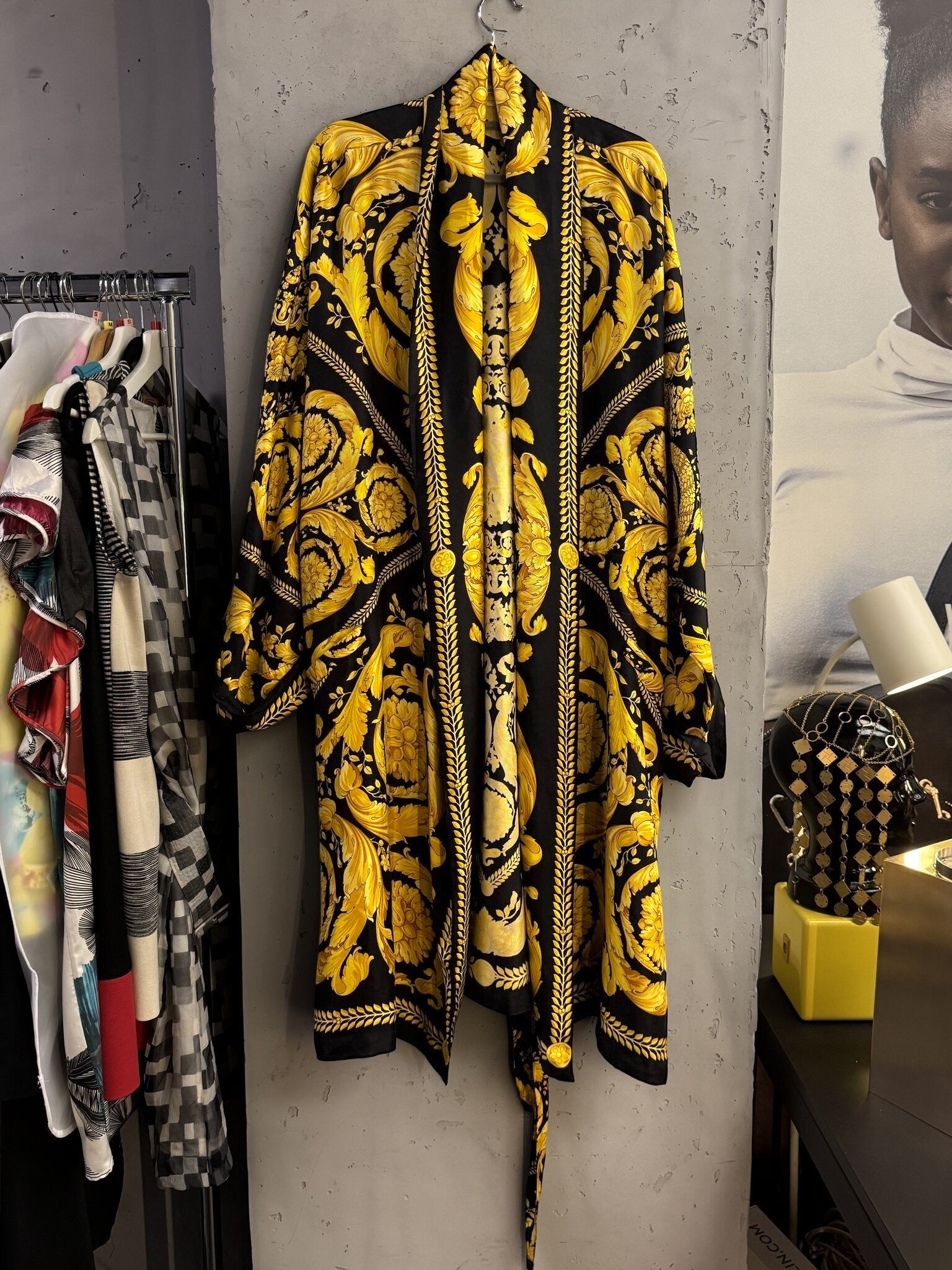 BERLIN VINTAGE CORNER long kimono robe featuring a bold black and gold baroque print with ornate patterns.