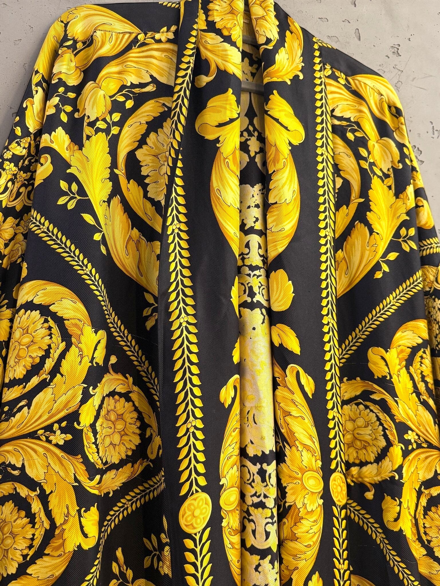BERLIN VINTAGE CORNER long kimono robe featuring a bold black and gold baroque print with ornate Mediterranean patterns.