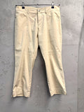 BERLIN VINTAGE CORNER beige cotton blend cropped trousers with five-pocket design and split hem.