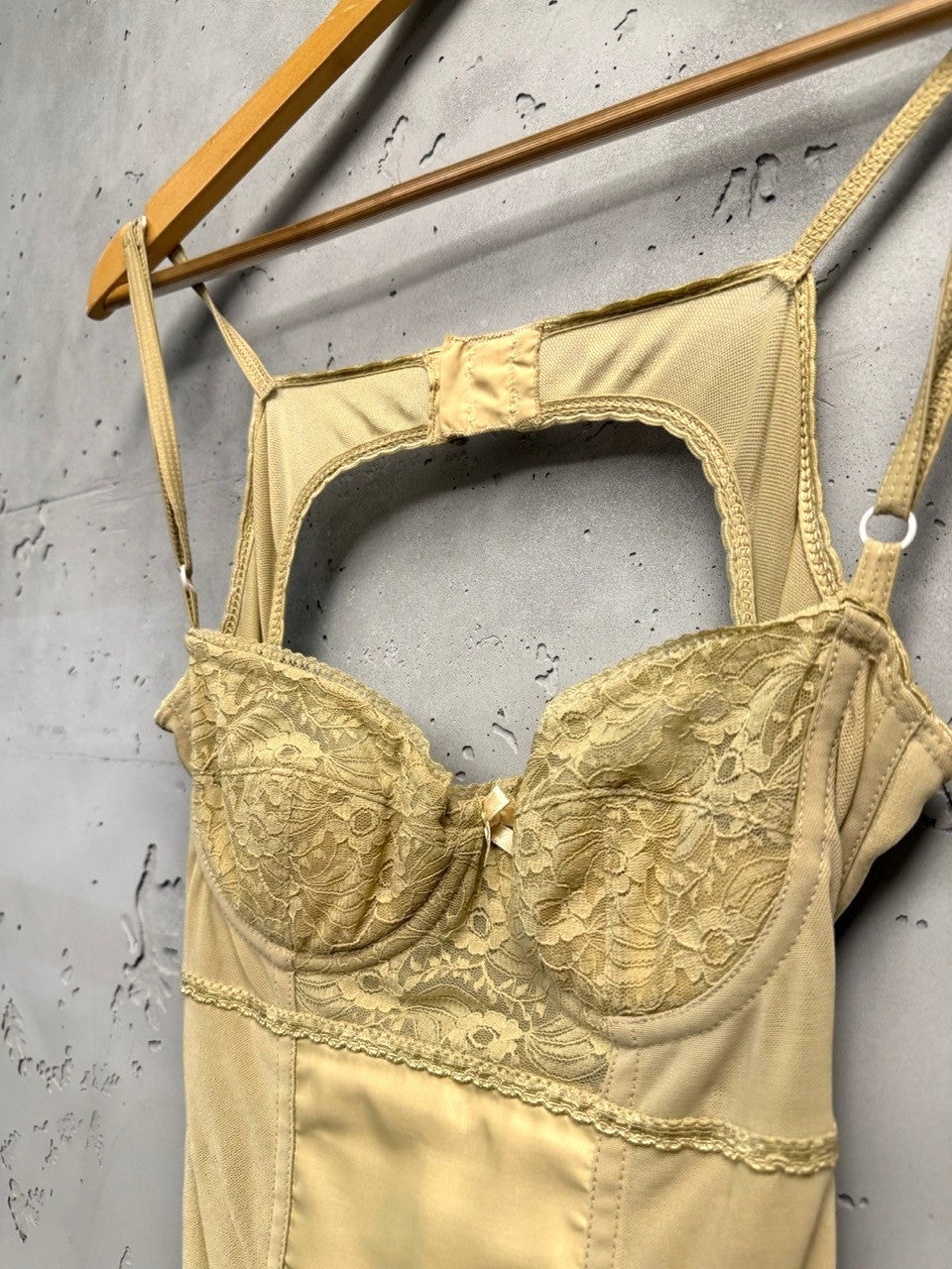 BERLIN VINTAGE CORNER beige satin-like corset dress with intricate lace bust and cut-out detail. Adjustable straps.