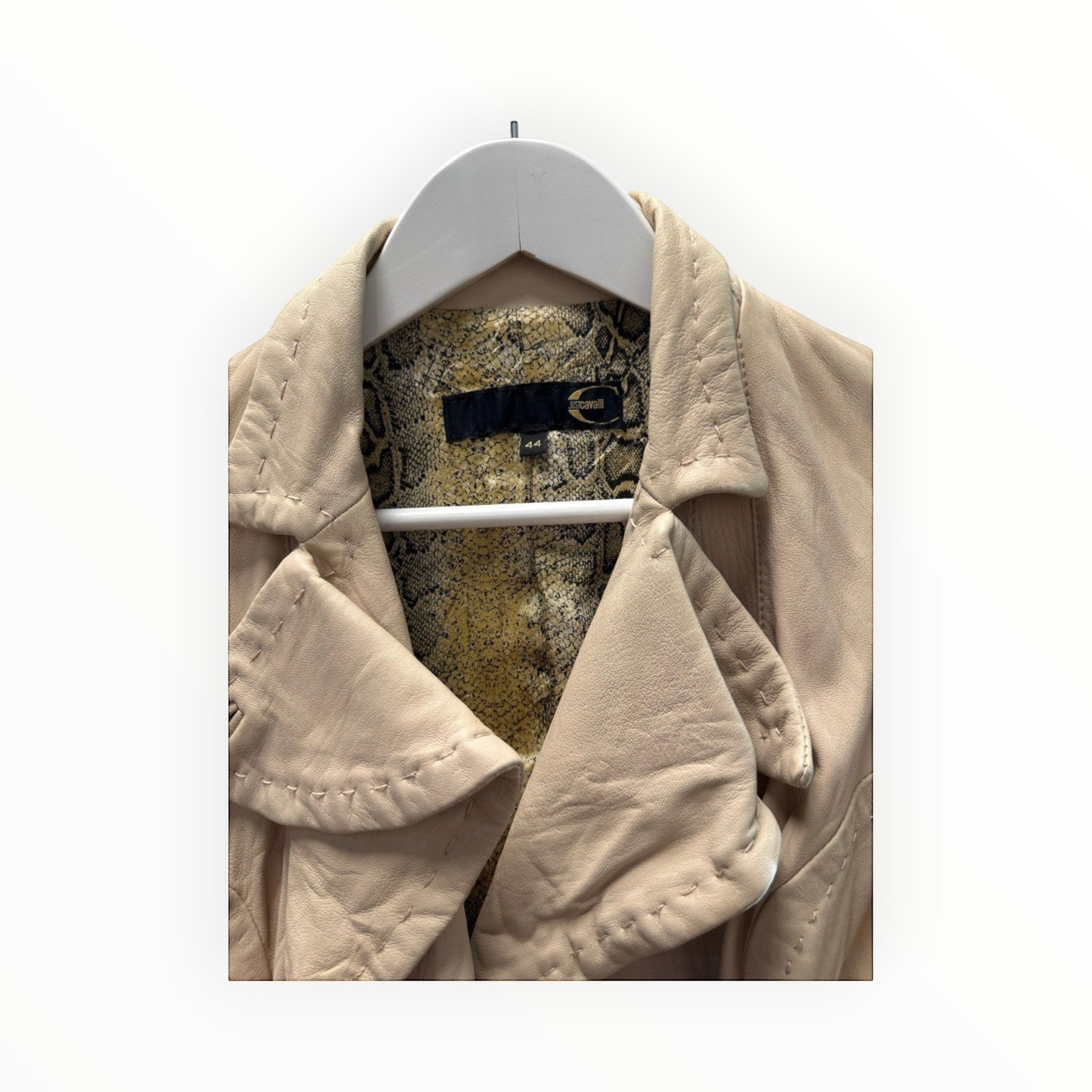 BERLIN VINTAGE CORNER beige leather jacket with snake print lining and unique stitching detail.