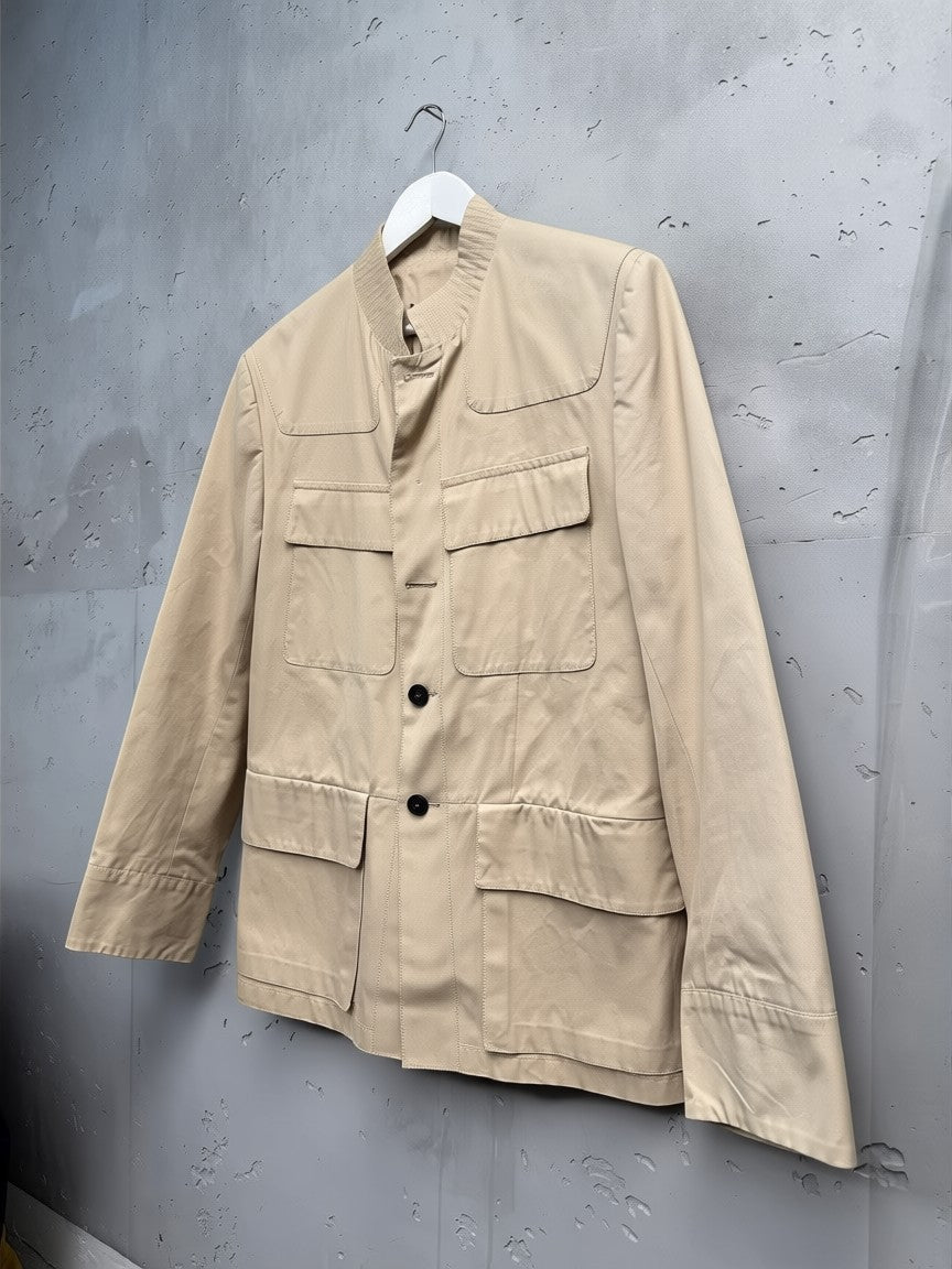 BERLIN VINTAGE CORNER beige cotton blend safari jacket with textured collar and multiple pockets.