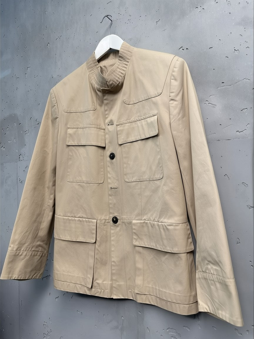 BERLIN VINTAGE CORNER beige cotton blend safari jacket with textured collar, button-down front, and multiple pockets.