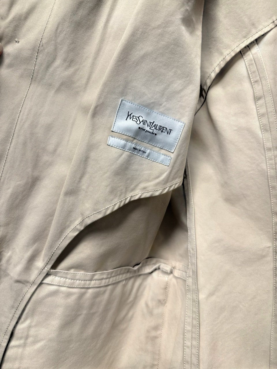 BERLIN VINTAGE CORNER beige cotton blend safari jacket with YSL logo detail and textured collar.