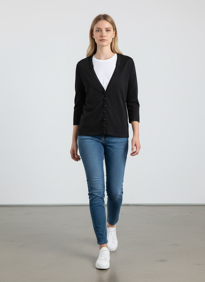 BERLIN VINTAGE CORNER black fine knit cardigan with braided neckline detail and three-quarter sleeves.
