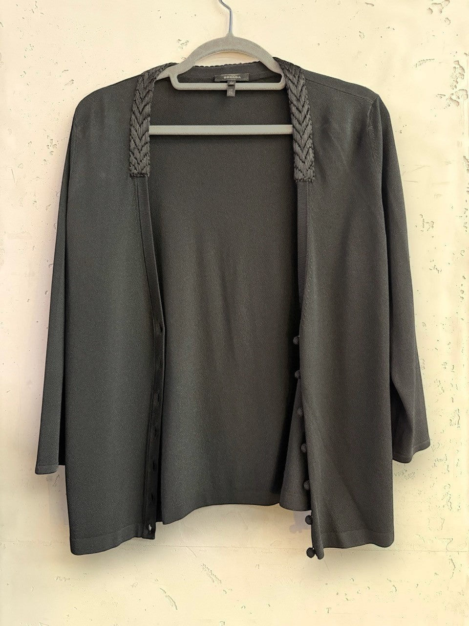 BERLIN VINTAGE CORNER black fine knit cardigan with braided neckline detail and three-quarter sleeves.