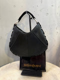 BERLIN VINTAGE CORNER black hobo shoulder bag with crescent moon shape, velvet strap, and lacing detail.