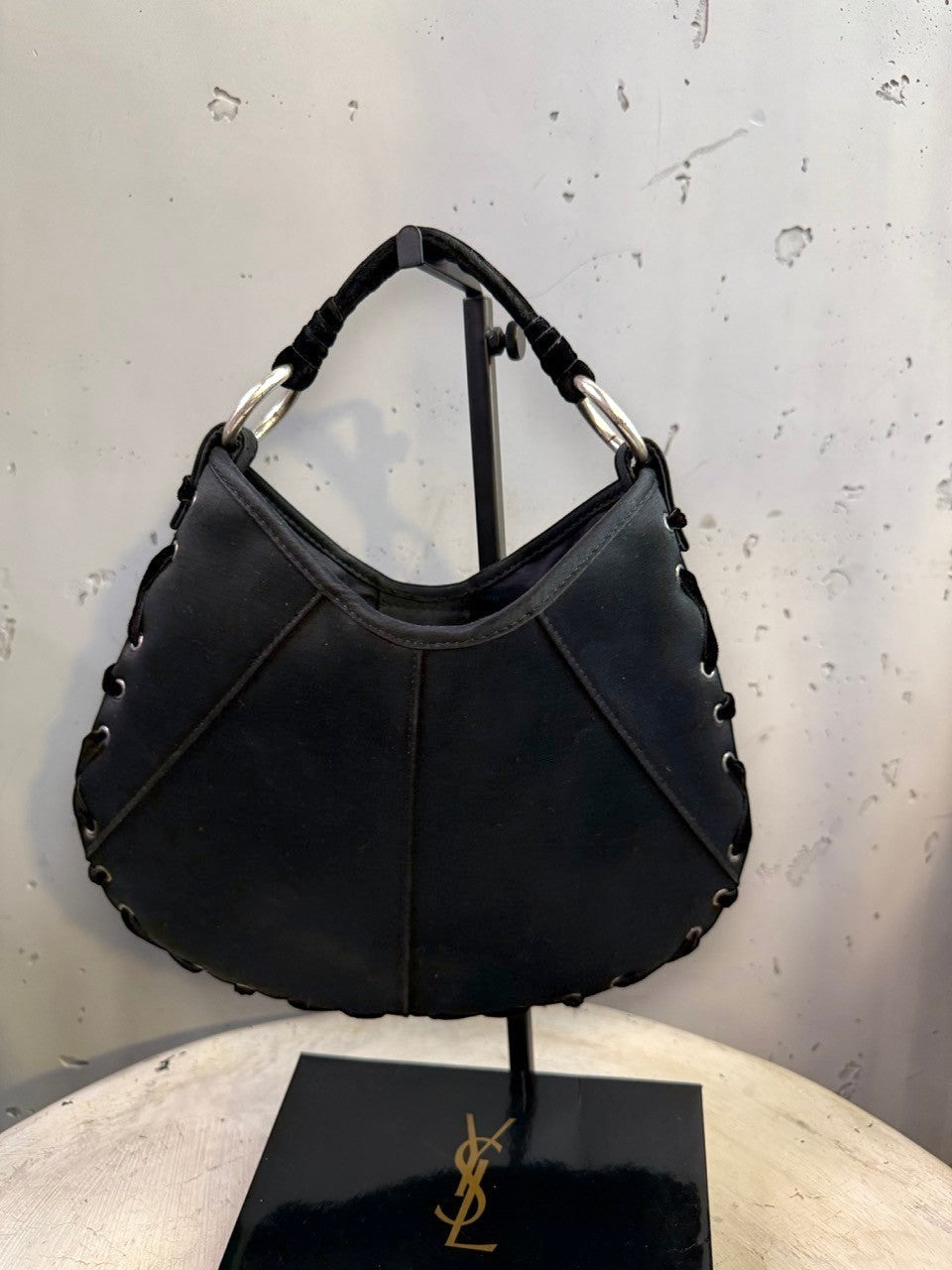 BERLIN VINTAGE CORNER black hobo shoulder bag with crescent moon shape, lacing detail, silver-tone hardware, and velvet strap.