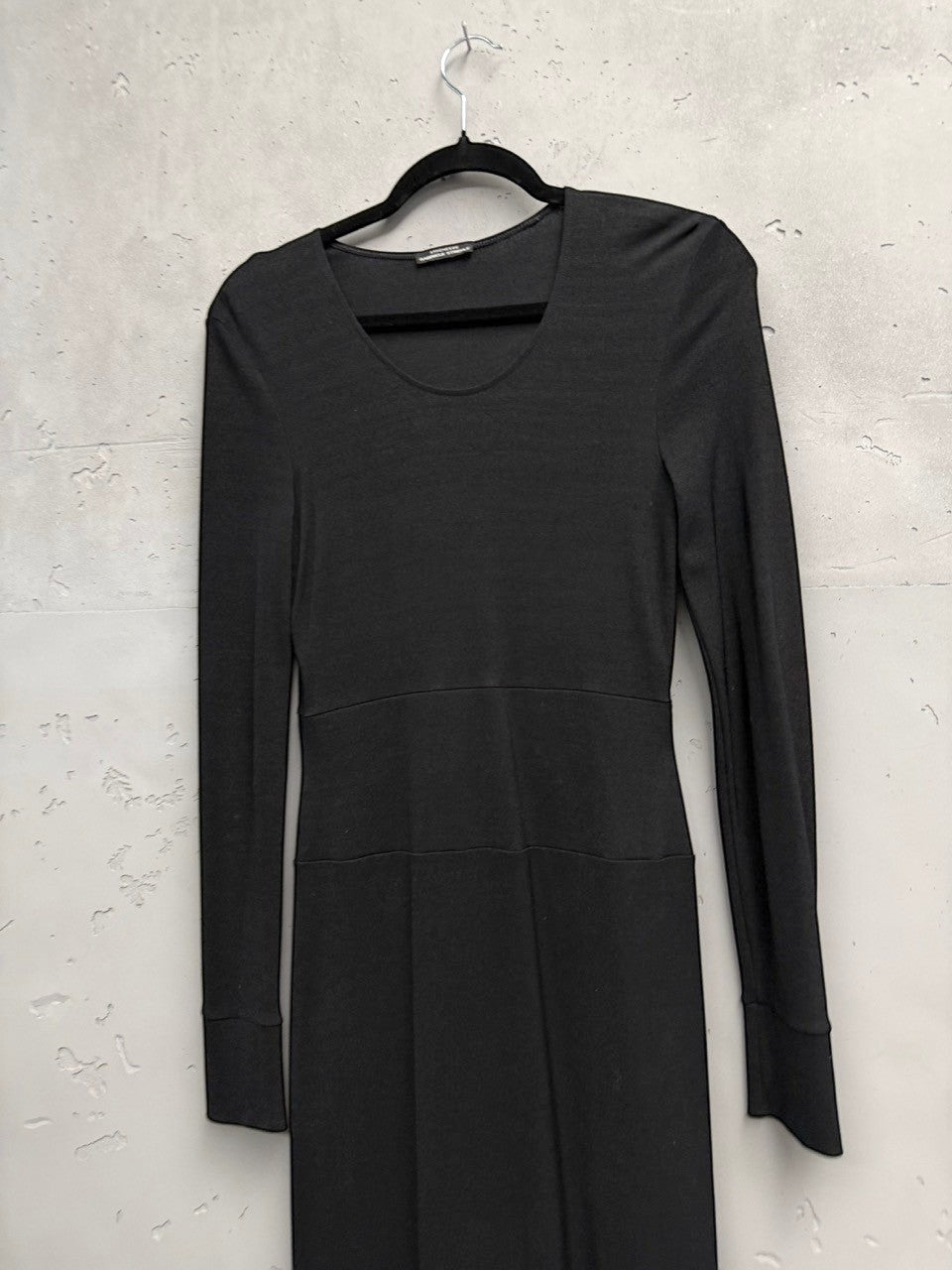 BERLIN VINTAGE CORNER black long sleeve knit midi dress with scoop neckline and defined waistline.