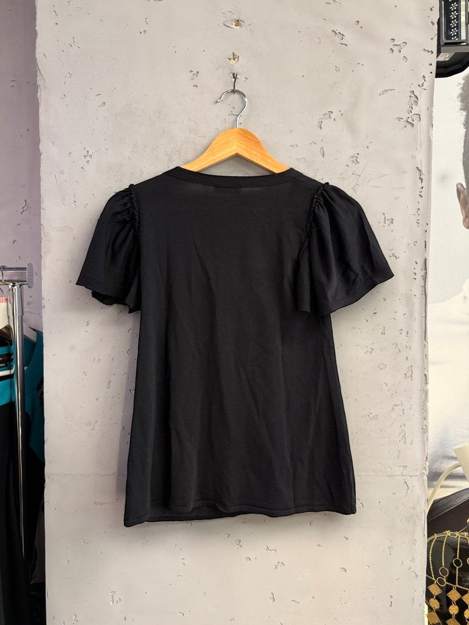 BERLIN VINTAGE CORNER black knit top by Moschino Cheap and Chic featuring flutter sleeves and a round neckline.