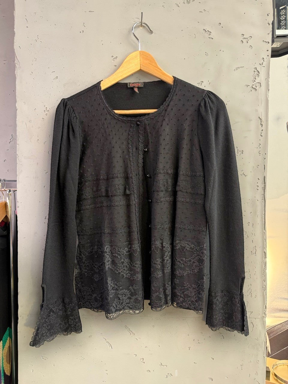 BERLIN VINTAGE CORNER black long sleeve knit top with lace trim and flared cuffs