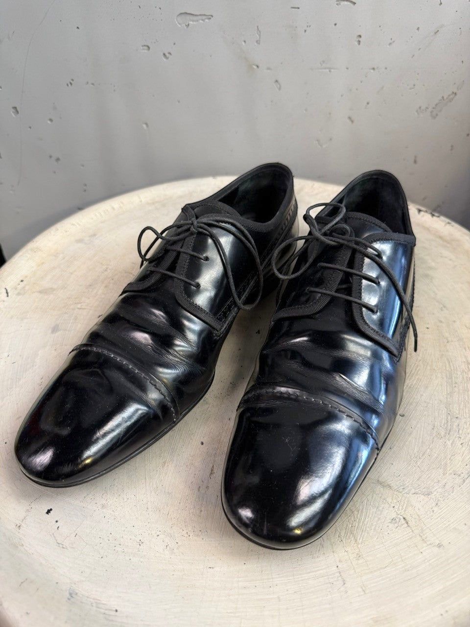 BERLIN VINTAGE CORNER black polished leather lace-up dress shoes with stitched detailing.