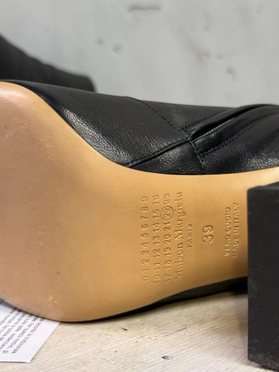 BERLIN VINTAGE CORNER black leather square toe heeled boots with tan heel detail and side zipper.