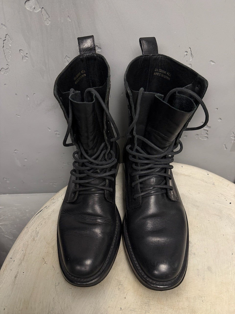 BERLIN VINTAGE CORNER black leather lace-up boots with robust sole and secure fit.