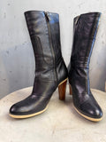 BERLIN VINTAGE CORNER black leather mid-calf boots with pointed toe and wooden block heel.