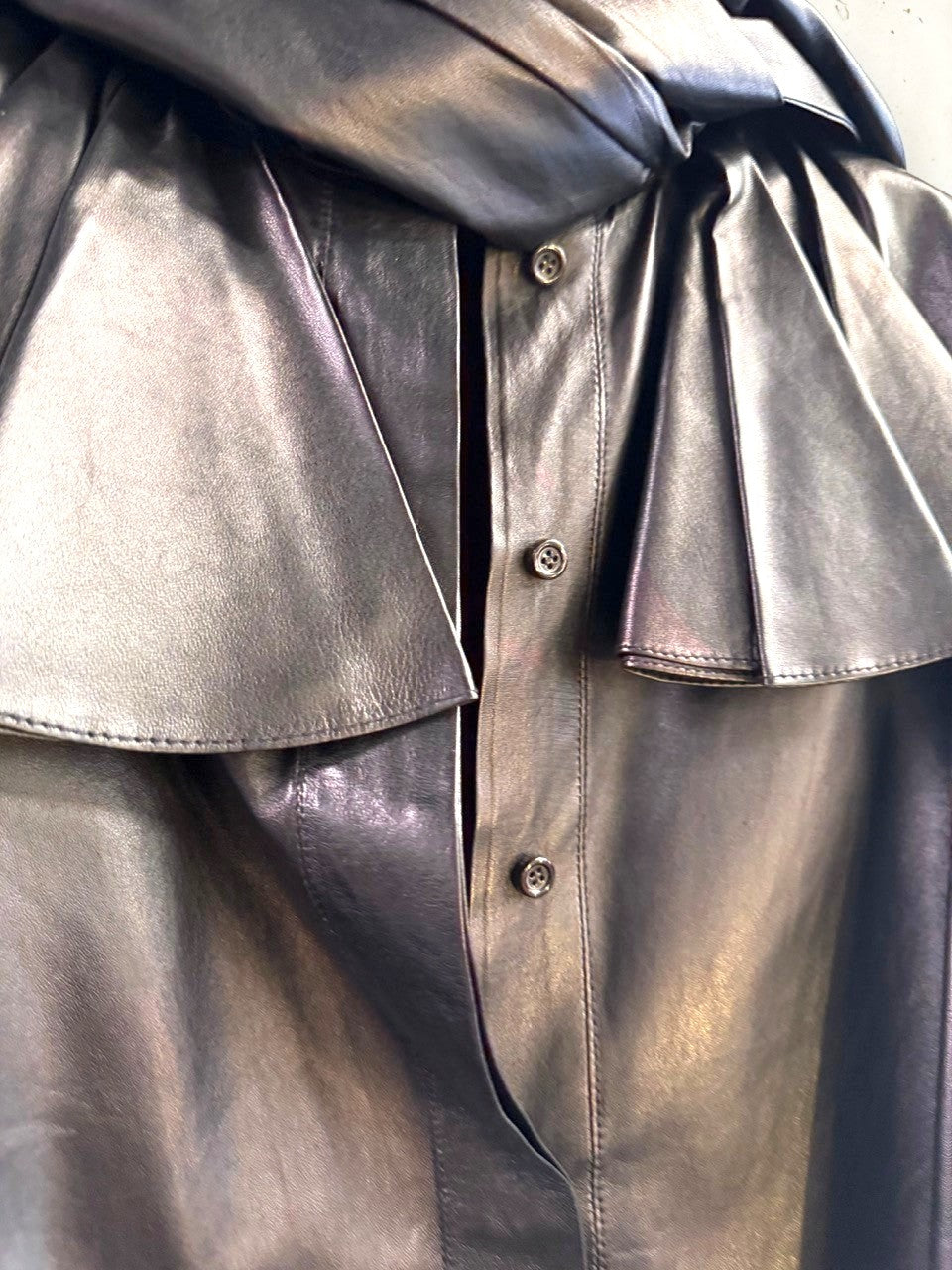 BERLIN VINTAGE CORNER black leather button-up shirt with ruffled yoke detail and button cuffs.