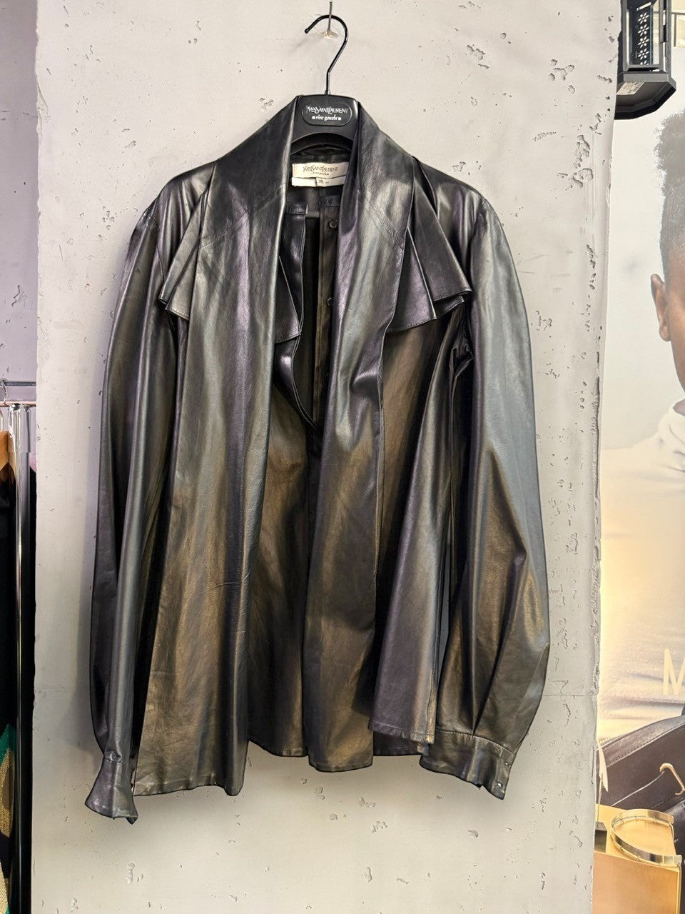 BERLIN VINTAGE CORNER black leather button-up shirt with ruffled yoke and button cuffs.