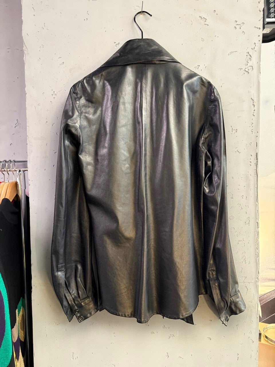 BERLIN VINTAGE CORNER black leather button-up shirt with collared neckline and button cuffs.