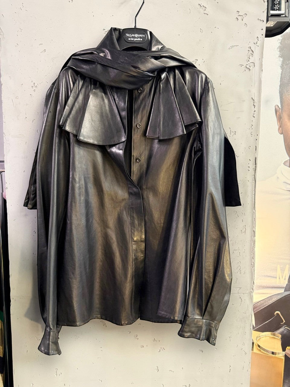 BERLIN VINTAGE CORNER black leather shirt with ruffled yoke and scarf detail. Button-up front and cuffs.