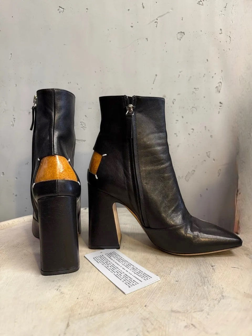 BERLIN VINTAGE CORNER black leather ankle boots with square toe, block heel, and tan leather heel detail.