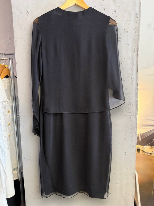 BERLIN VINTAGE CORNER black midi dress with sheer sleeves and asymmetrical neckline. Flowing fabric.