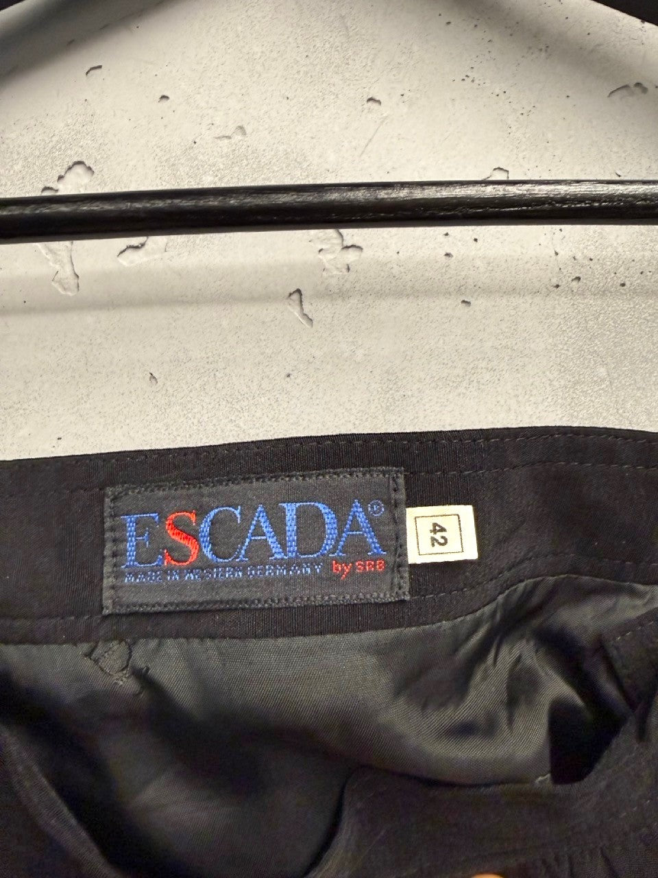 BERLIN VINTAGE CORNER black midi skirt with satin side panels and size 42 tag.