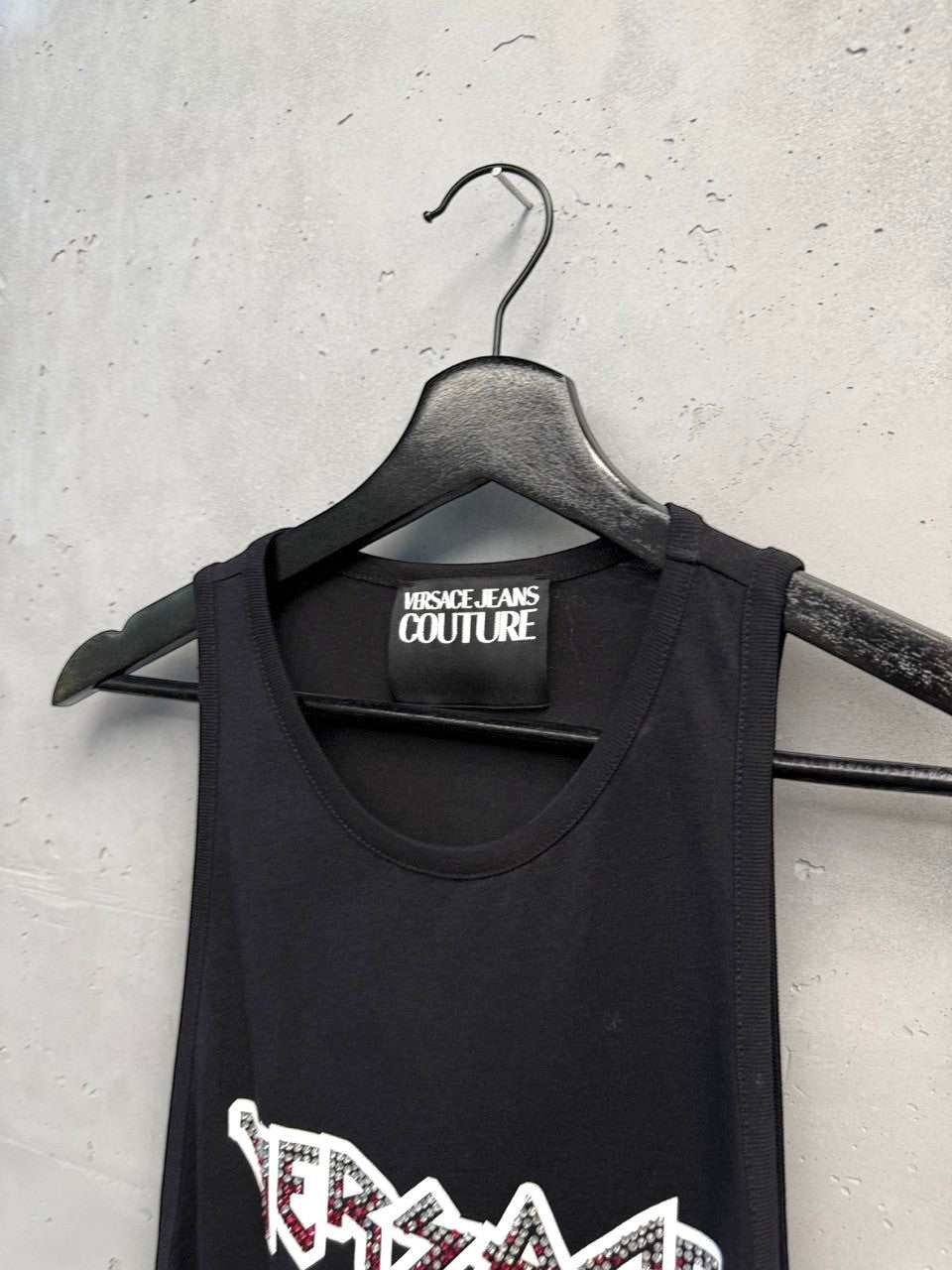 BERLIN VINTAGE CORNER black cotton tank top with rhinestone Versace Jeans Couture logo on chest. Sleeveless, relaxed fit.