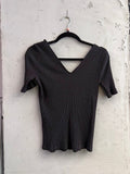 BERLIN VINTAGE CORNER black ribbed V-neck short sleeve knit top with a flattering fit.