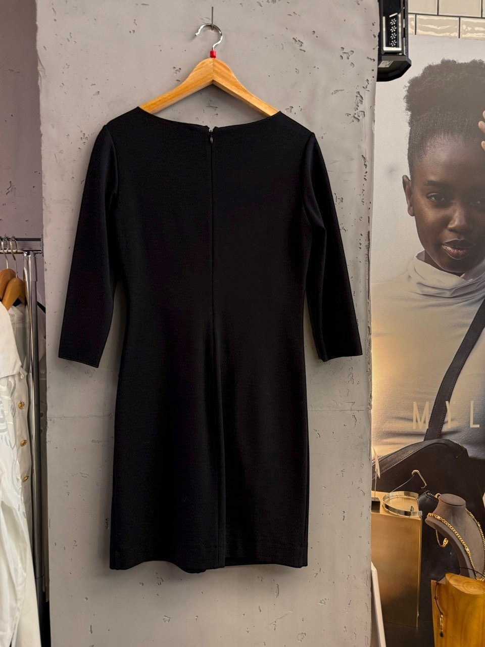 BERLIN VINTAGE CORNER black three-quarter sleeve ruched midi dress with boat neckline and concealed back zipper.
