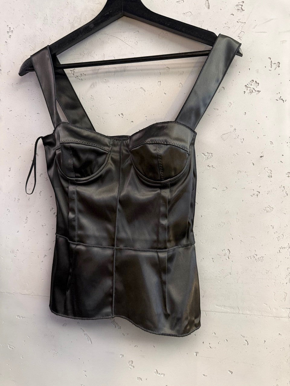 BERLIN VINTAGE CORNER black satin corset tank top with molded cups and wide straps on a hanger