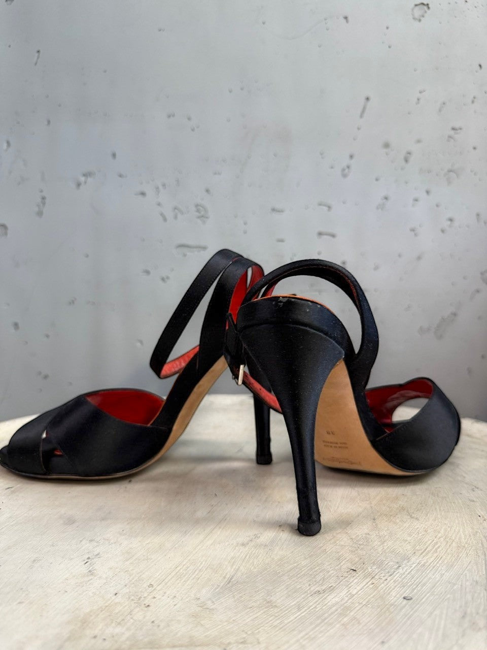 BERLIN VINTAGE CORNER black satin strappy high heel sandals with red leather lining and buckle closure.