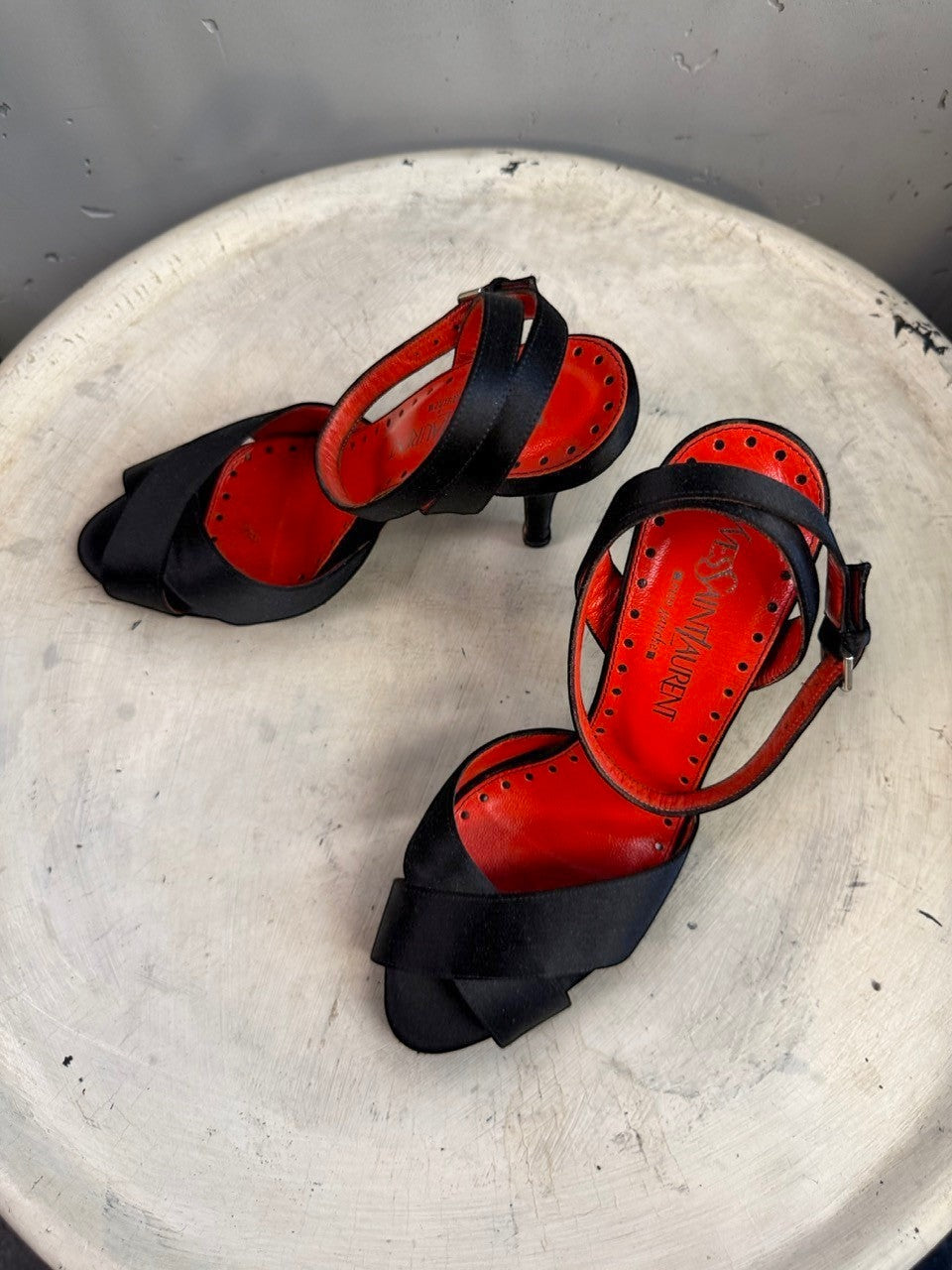 BERLIN VINTAGE CORNER black satin strappy high heel sandals with red leather lining and buckle closure.