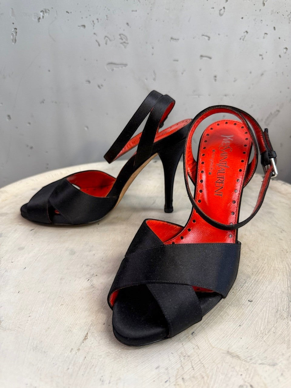 BERLIN VINTAGE CORNER black satin strappy high heel sandals with red leather lining and buckle closure.