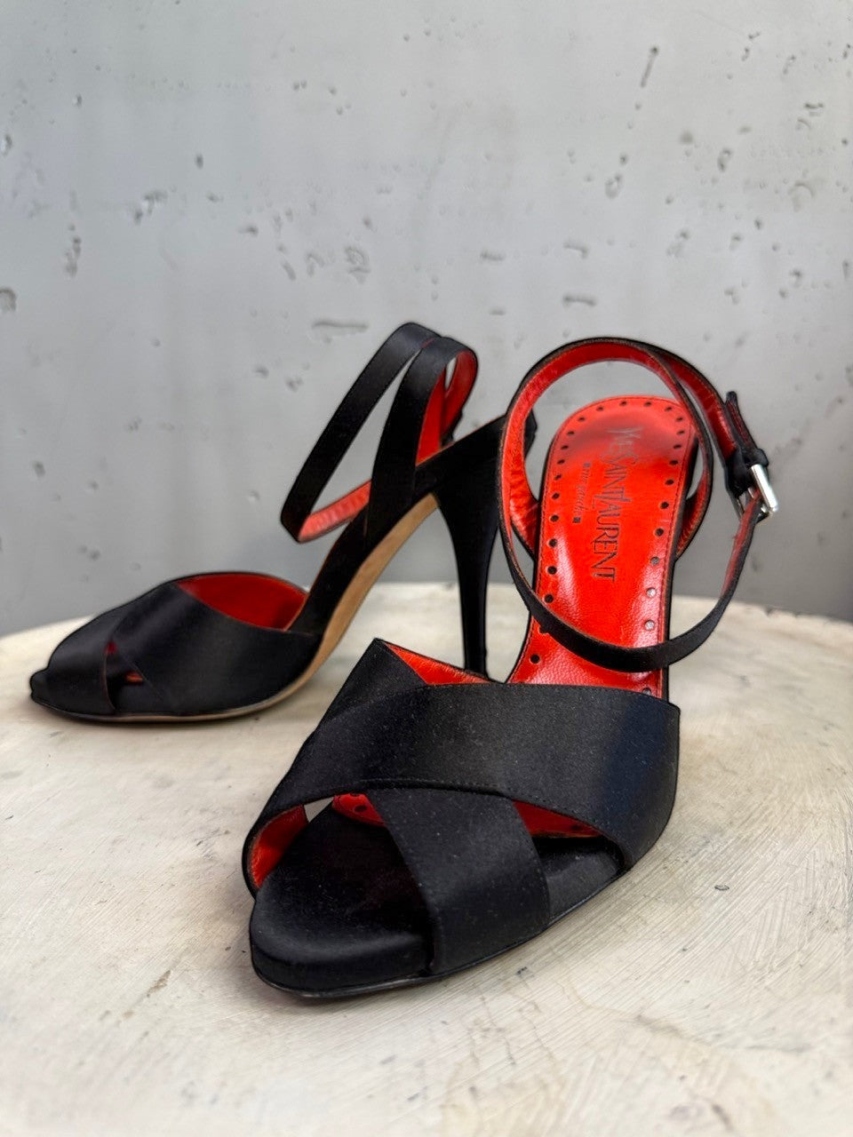 BERLIN VINTAGE CORNER black satin strappy high heel sandals with red leather lining and buckle closure.