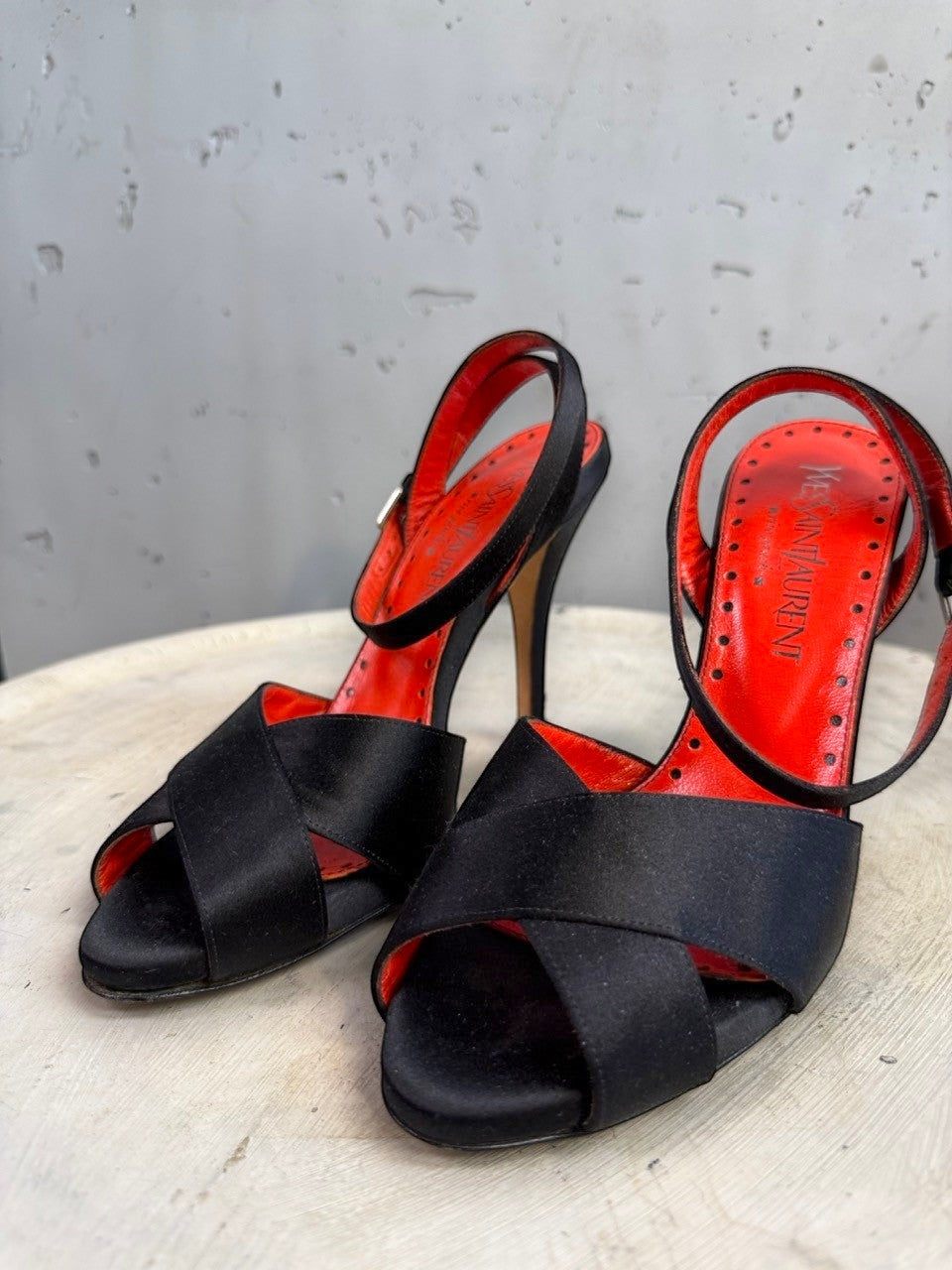 BERLIN VINTAGE CORNER black satin strappy high heel sandals with red leather lining and buckle closure.