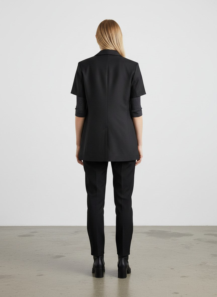 BERLIN VINTAGE CORNER black cotton blend short sleeve blazer with lapel and single button closure.