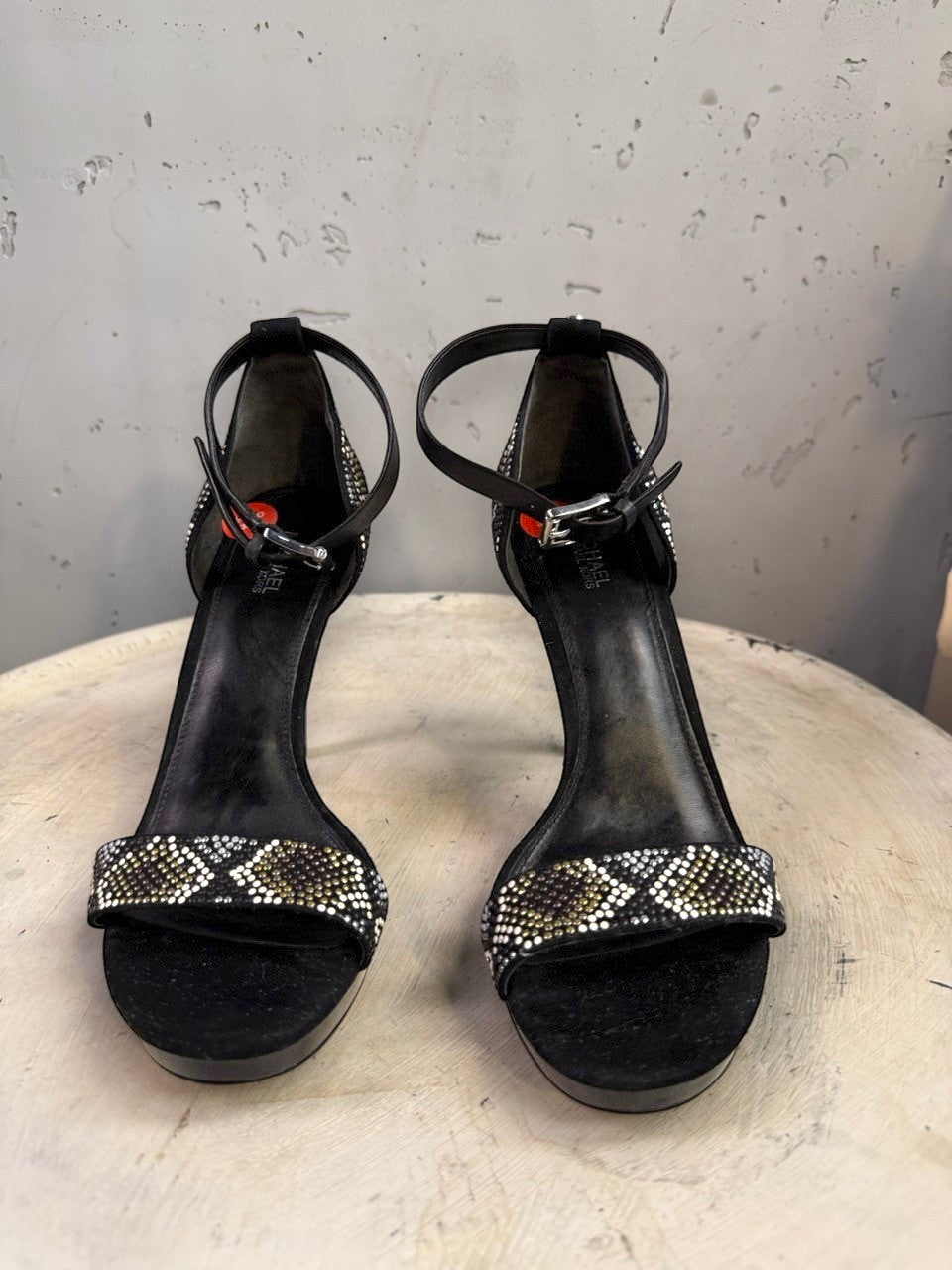 BERLIN VINTAGE CORNER black suede stiletto heels with rhinestone snake-print embellishments and ankle strap.