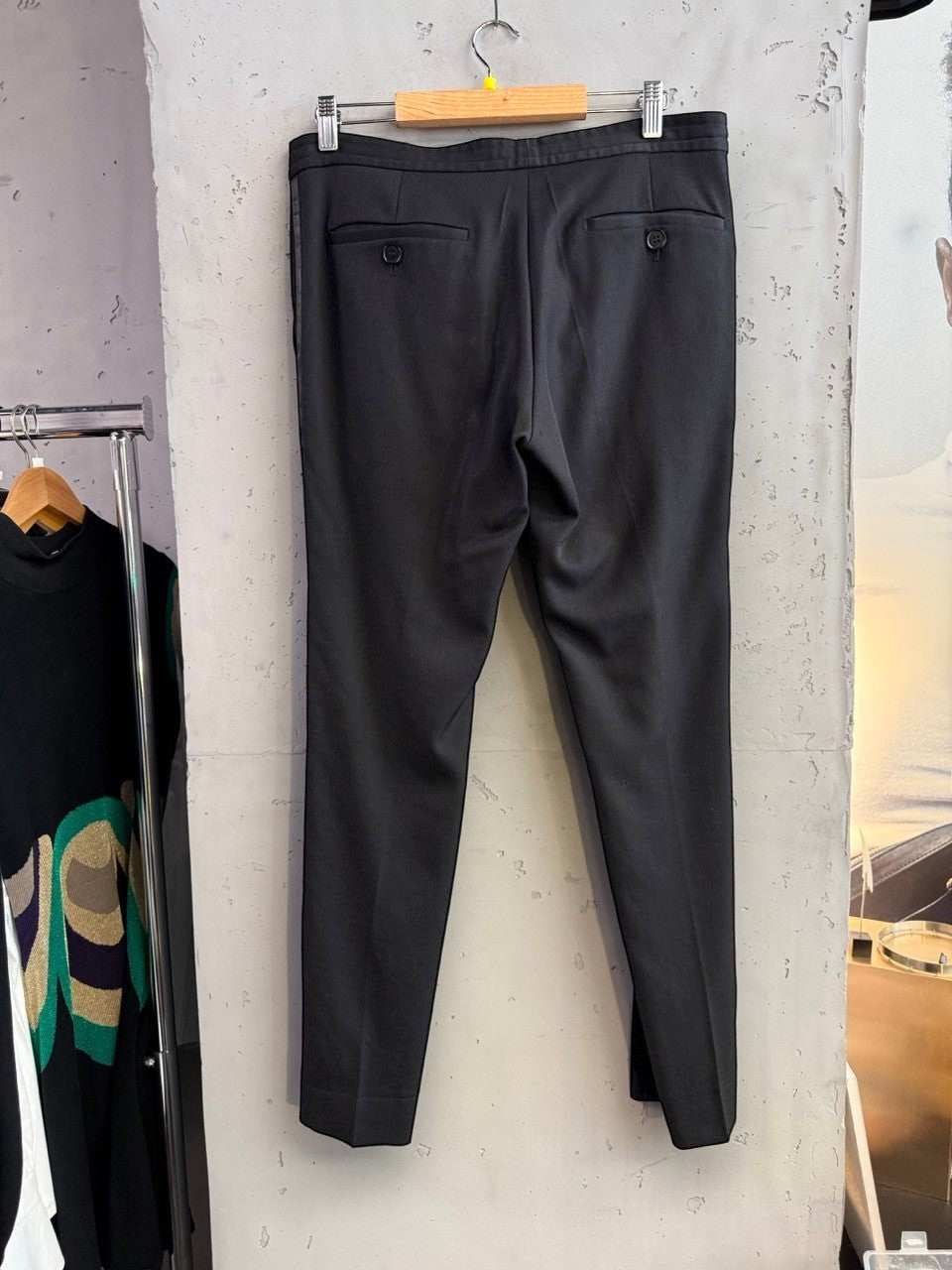 BERLIN VINTAGE CORNER black tailored dress pants with satin side stripe detail and button closure.