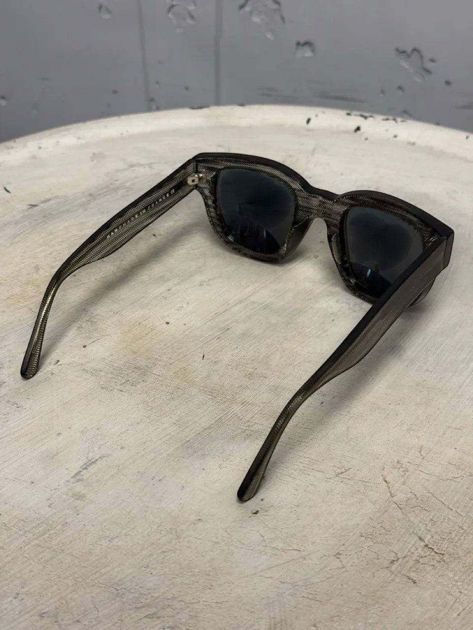 BERLIN VINTAGE CORNER black textured frame sunglasses with dark lenses and metal accents.