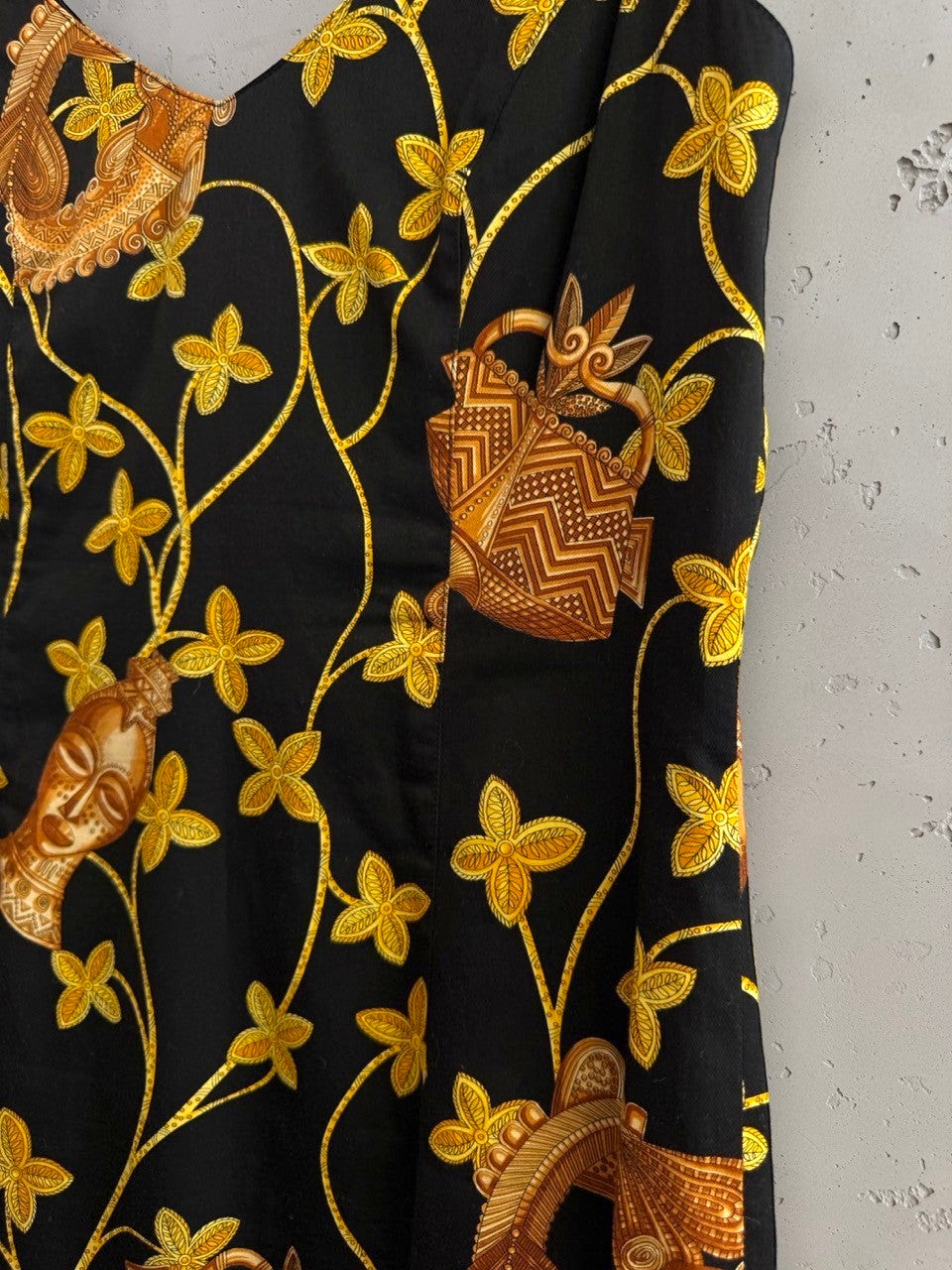 BERLIN VINTAGE CORNER black mini dress with gold and brown tribal floral print, V-neck, sleeveless