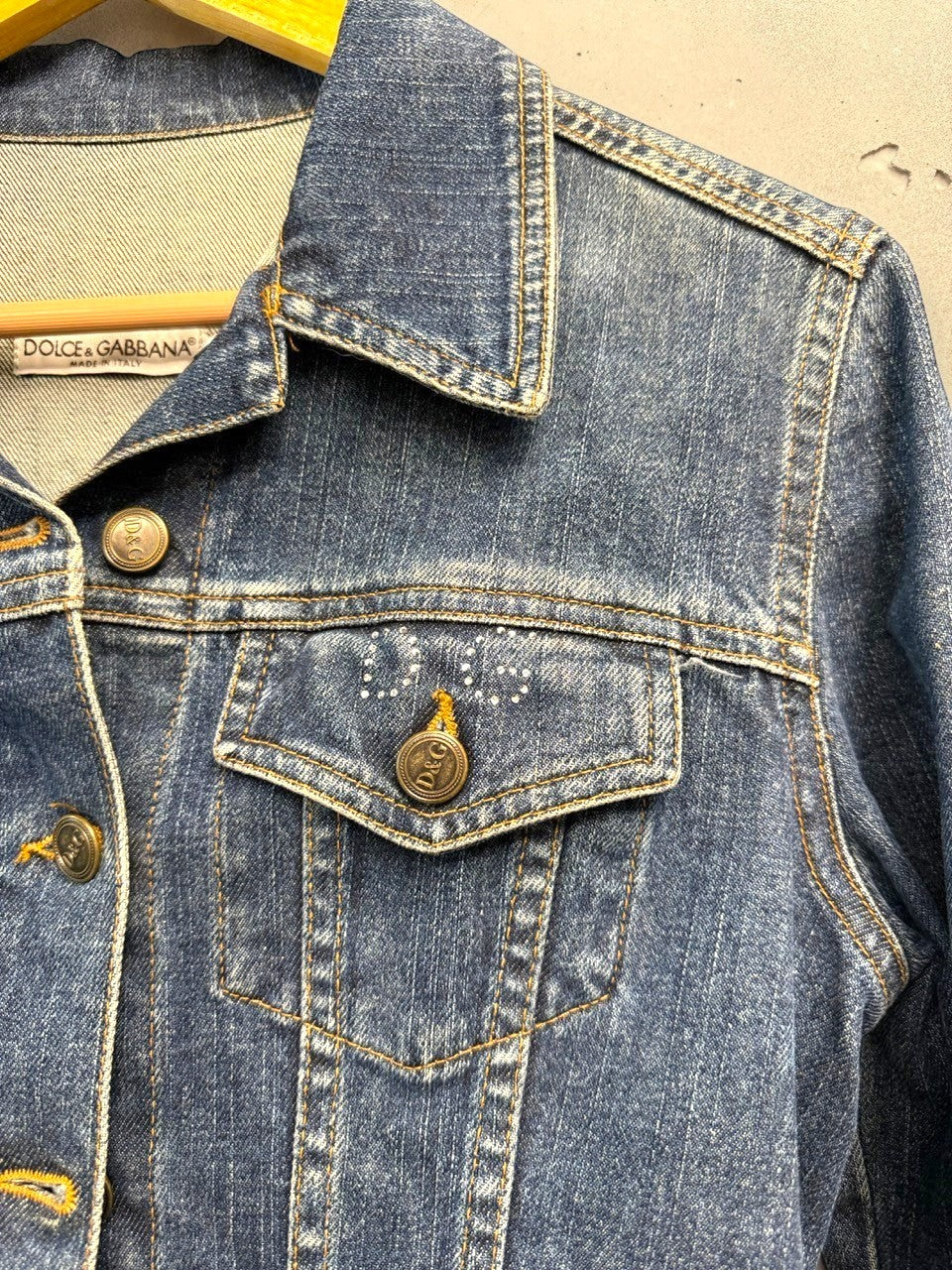 BERLIN VINTAGE CORNER blue denim jacket with D&G logo embellished chest pocket and button front.