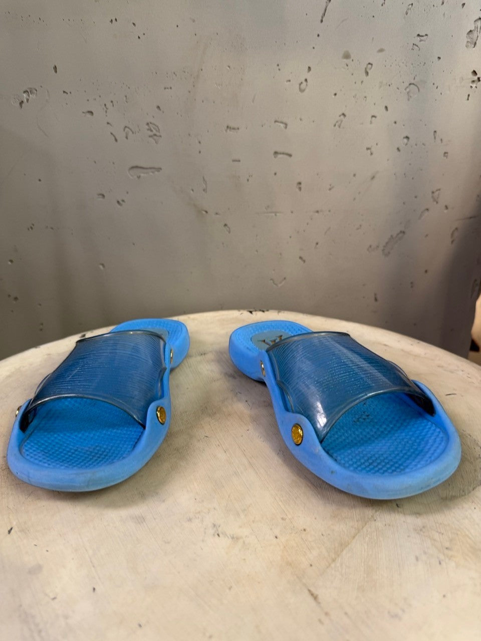 BERLIN VINTAGE CORNER blue translucent strap slides with gold-tone hardware and contoured footbed.