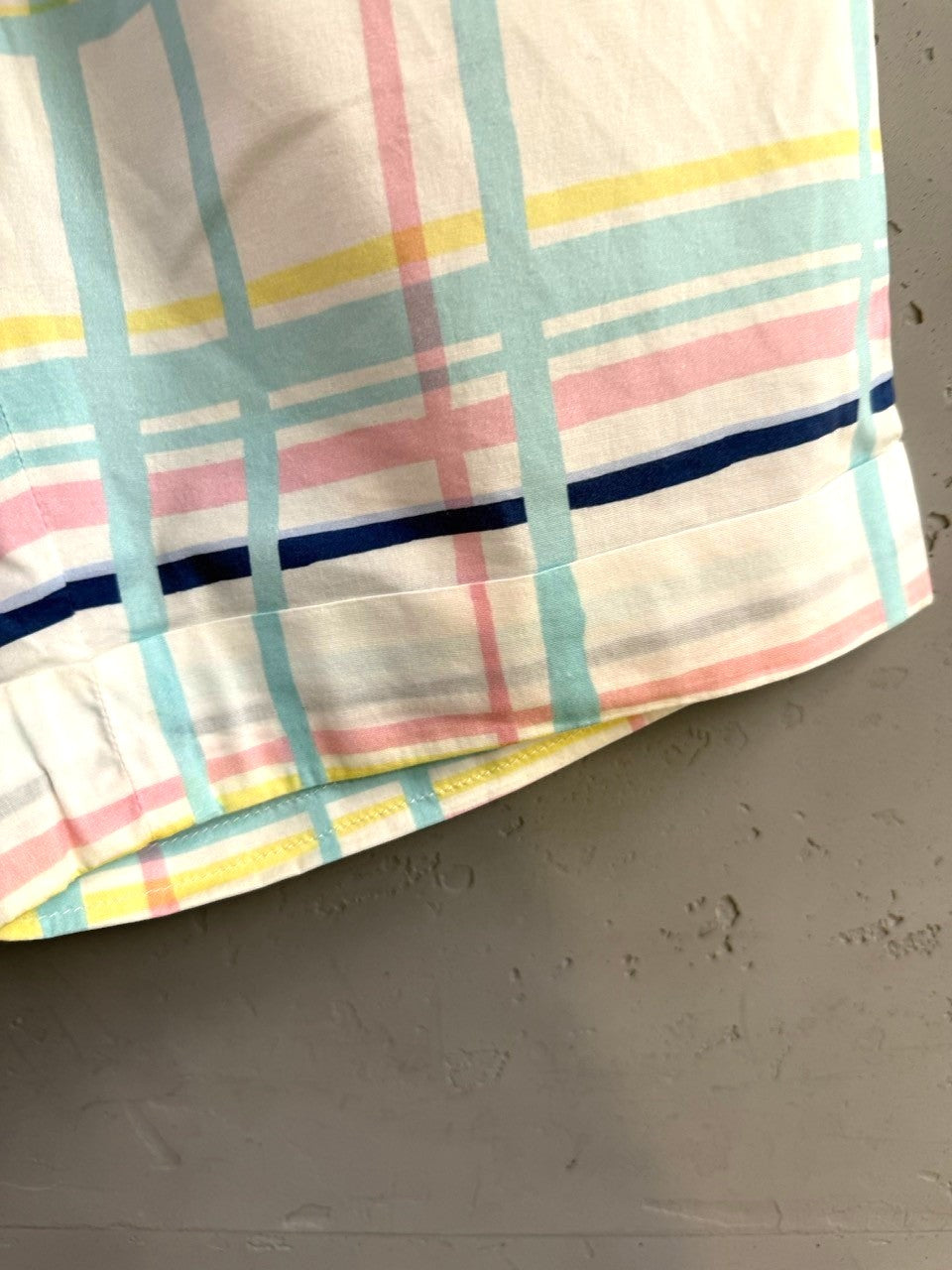 BERLIN VINTAGE CORNER Bogner cotton shorts featuring a pastel plaid pattern in pink, yellow, blue, and navy stripes.