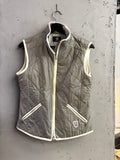 BERLIN VINTAGE CORNER grey diamond-quilted Bogner zip-up vest with white piping and stand-up collar.